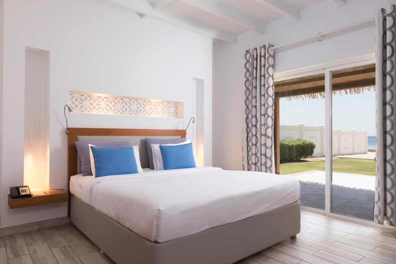 Sealine Beach, A Murwab Resort Muszajid Kültér fotó A bedroom at the resort