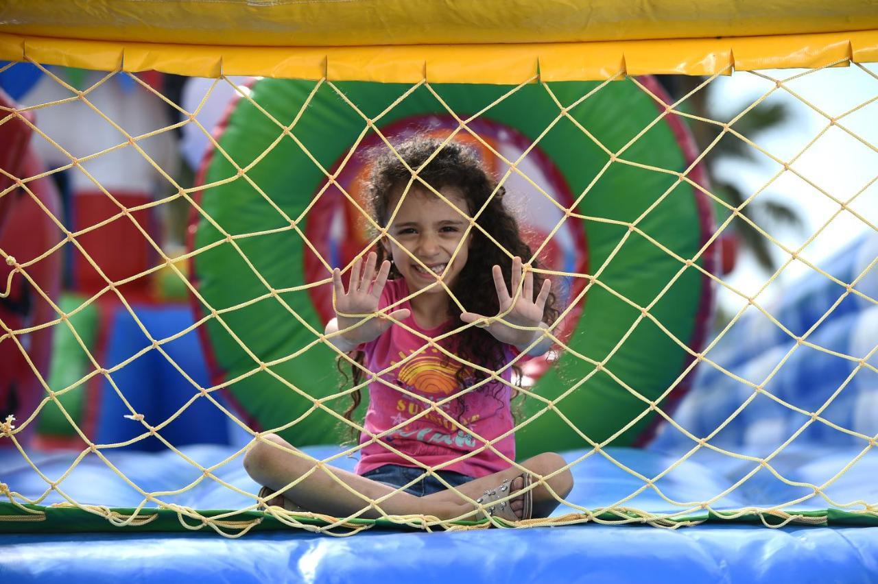 Sealine Beach, A Murwab Resort Muszajid Kültér fotó A child playing at the Children's Museum of Oak Ridge
