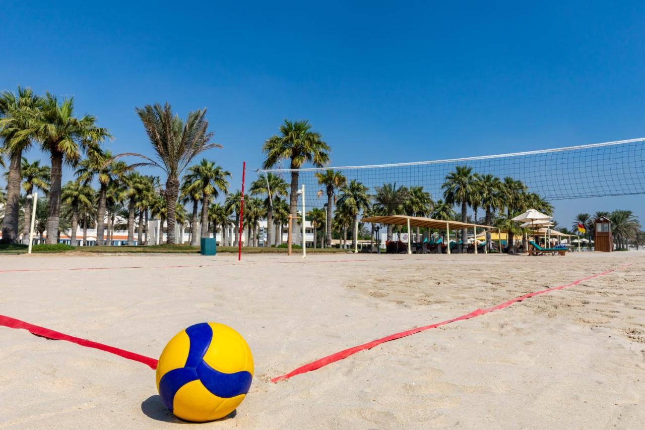 Sealine Beach, A Murwab Resort Muszajid Kültér fotó A beach volleyball court