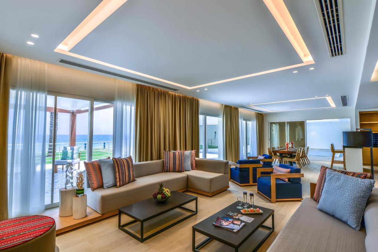 Sealine Beach, A Murwab Resort Muszajid Kültér fotó A suite at the hotel